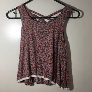 Crop top tank top with roses and crisscross back.
